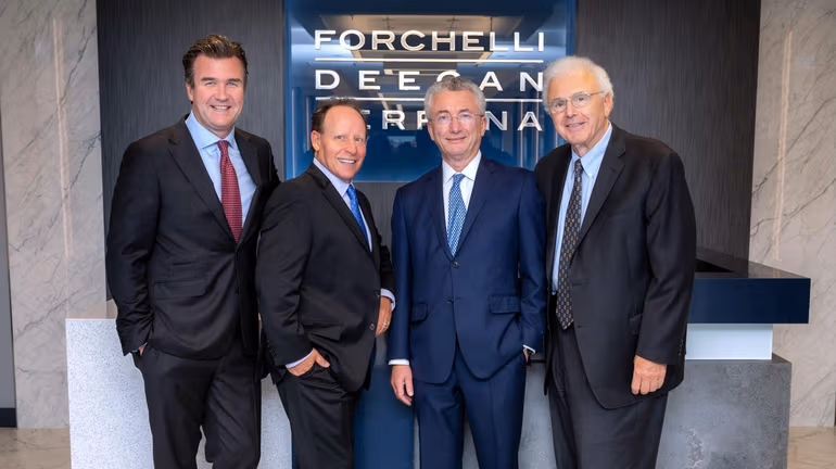 Members of the Firm in the Uniondale reception area.